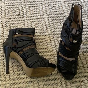 Gently used black high heels